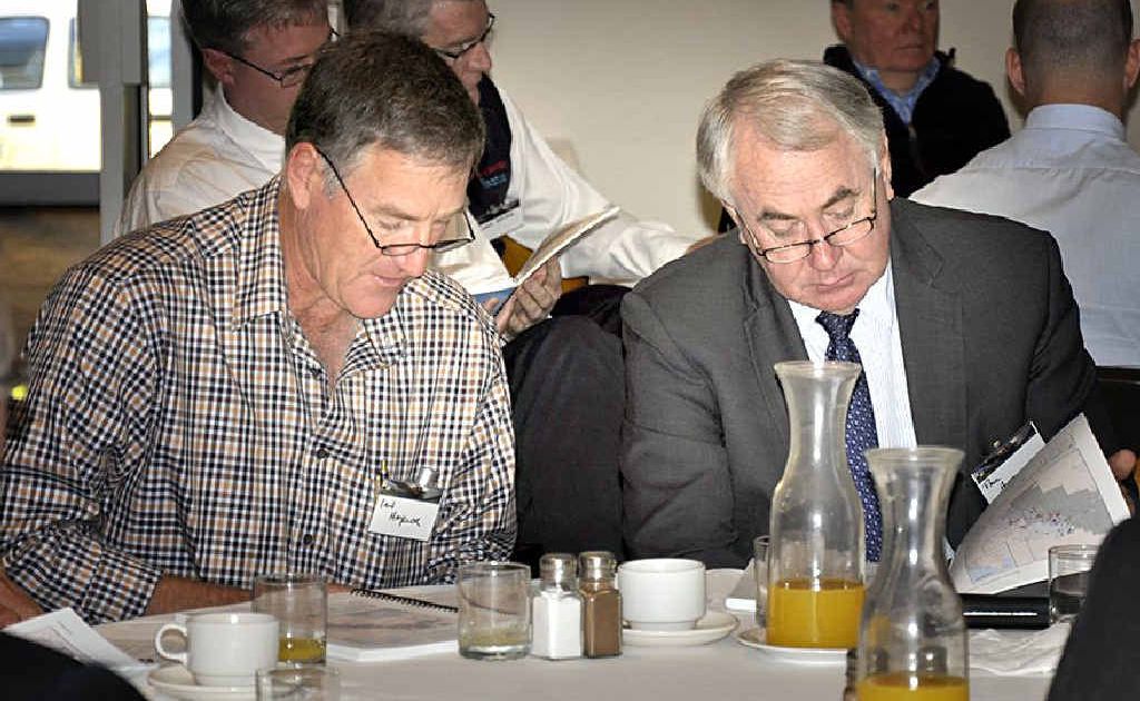 Dalby farmer Ian Hayllor (left) and Toowoomba Mayor Paul Antonio check the details at the release of the Queensland Water Commission’s Underground Water Impact Report. Dalby farmer Ian Hayllor (left) and Toowoomba Mayor Paul Antonio check the details at the release of the Queensland Water Commission’s Underground Water Impact Report.